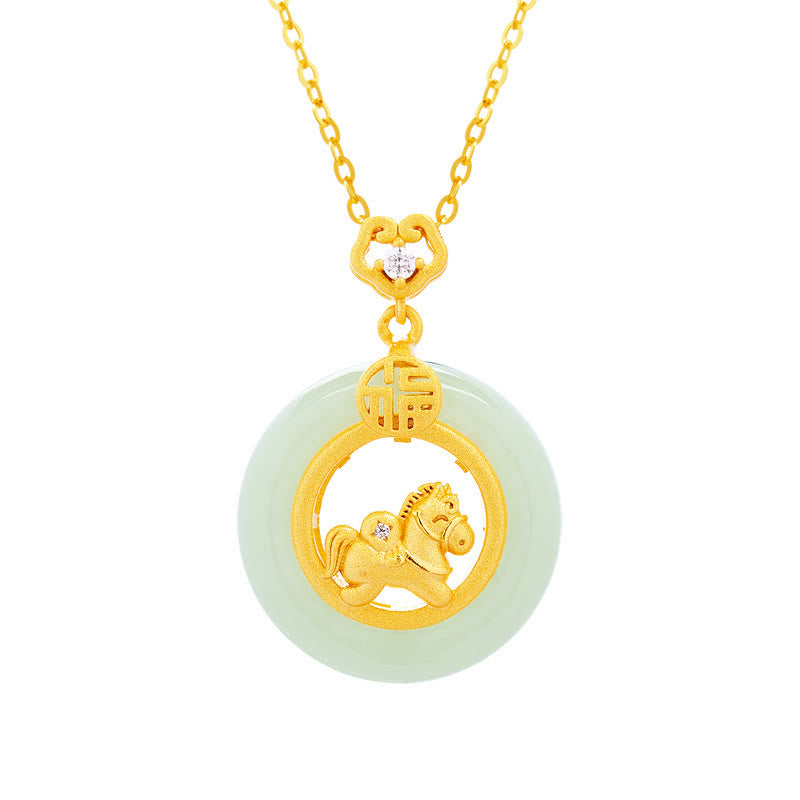 Gold and jade pendant necklace on a white background