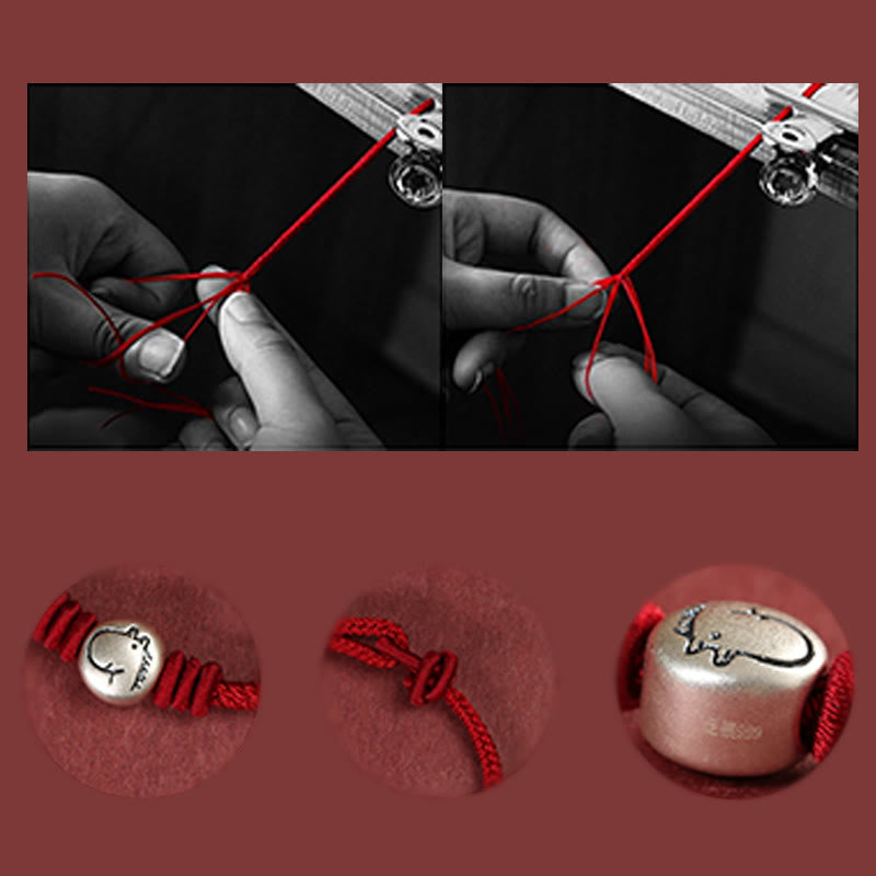 Bracelet with red string and silver charm being tied by hands, with close-up details on a red background.