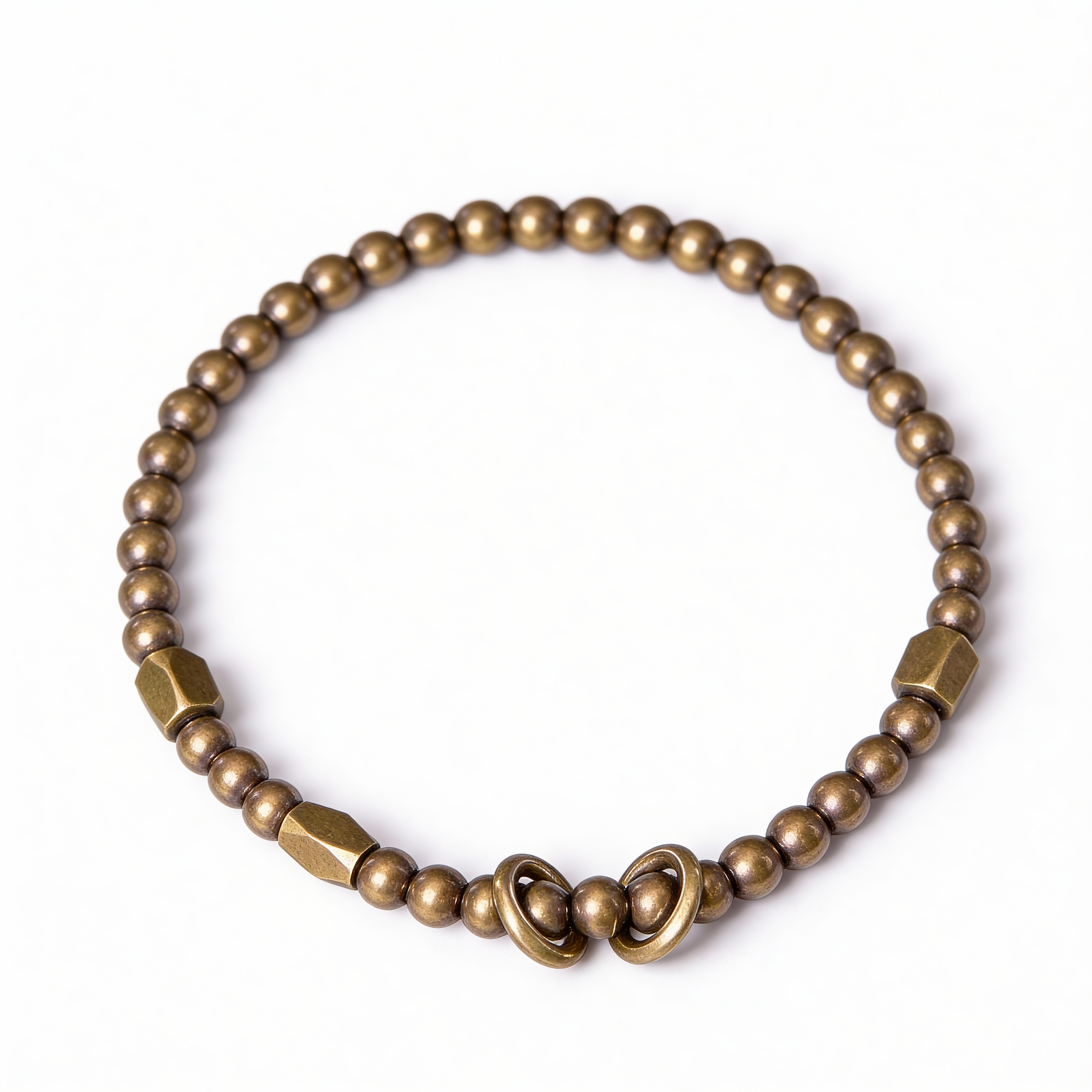 Brass beaded bracelet on a white background