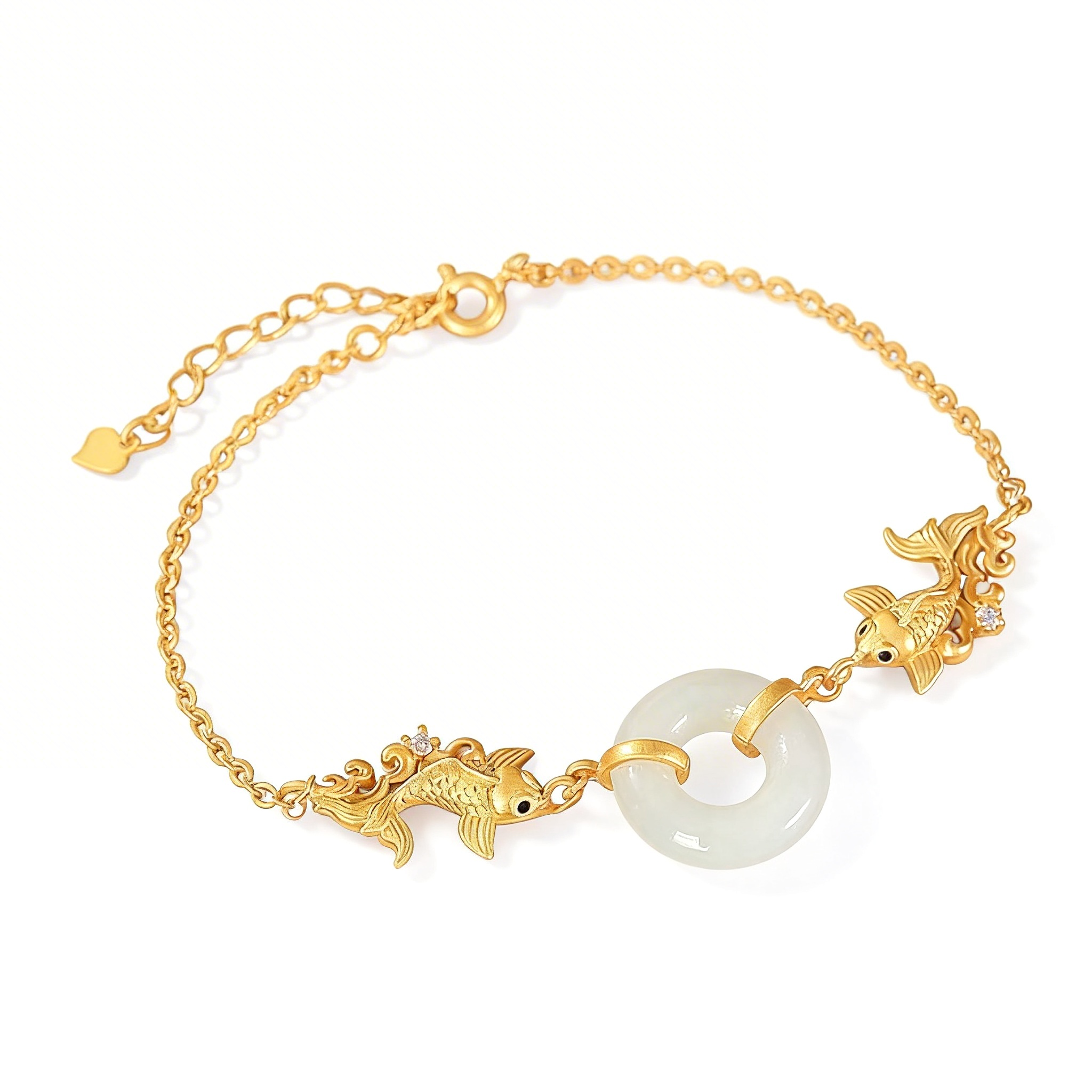 Gold bracelet with white jade charm and gold fish connectors on a white background