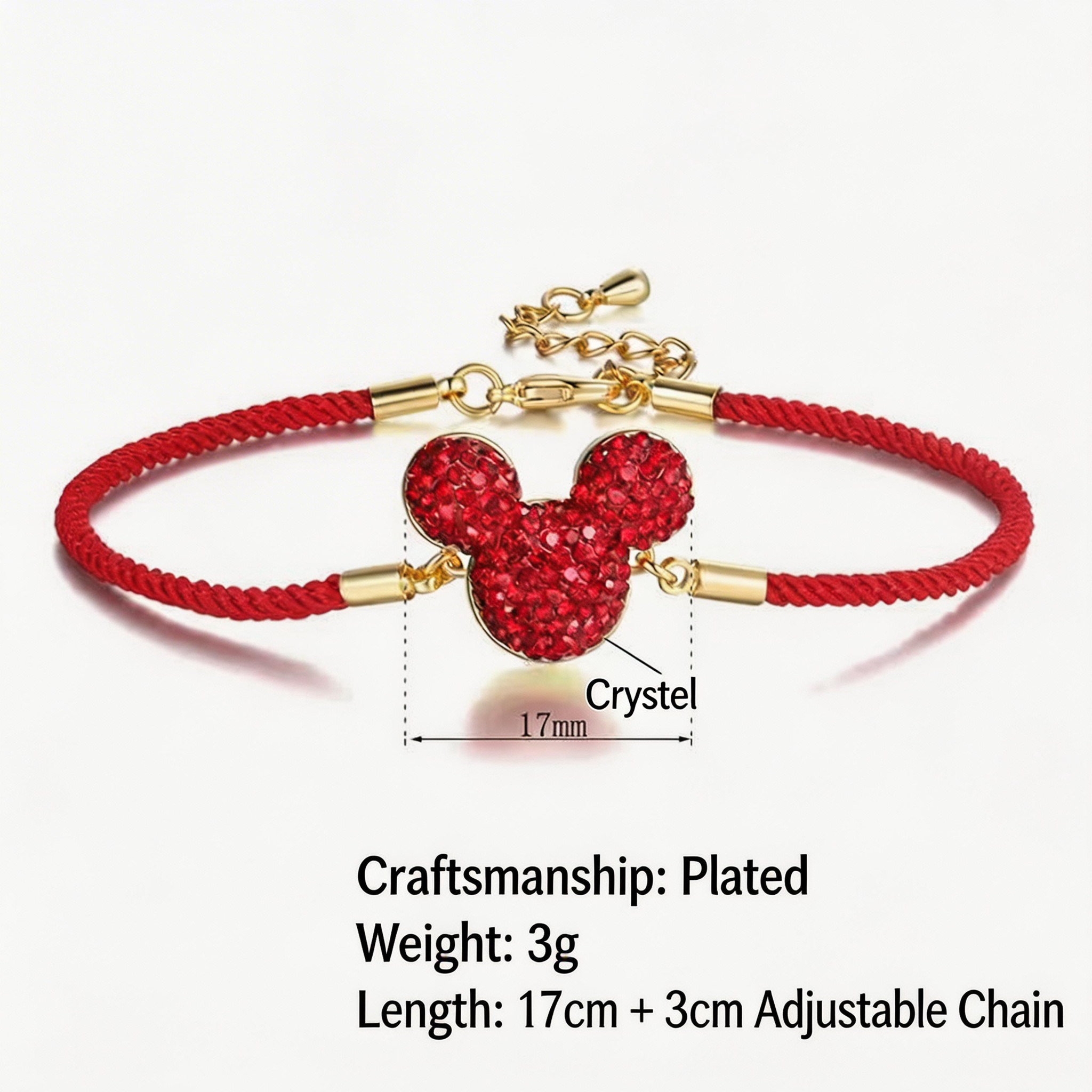 Red bracelet with a gold and red charm on a white background