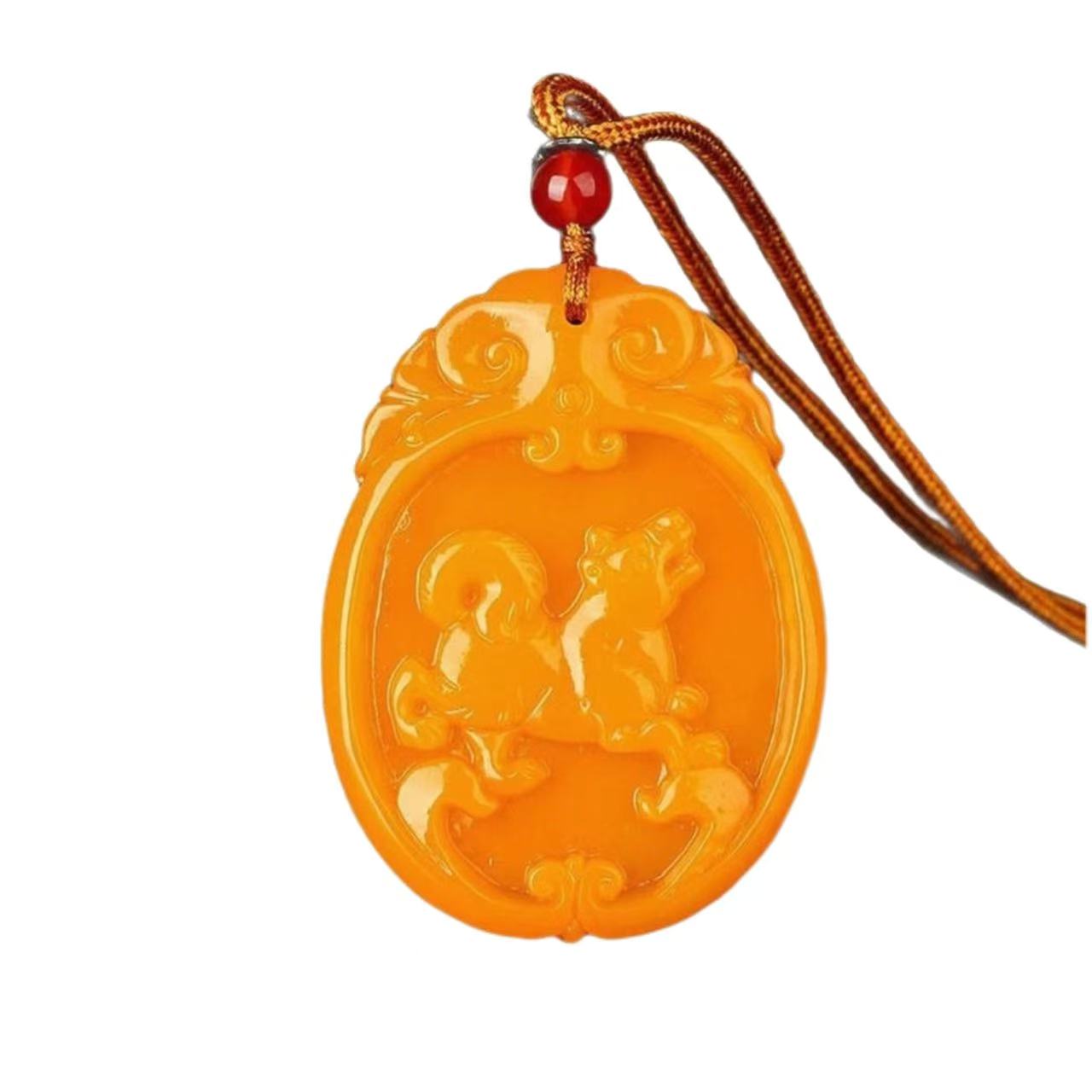 Orange jade pendant with intricate design on a white background