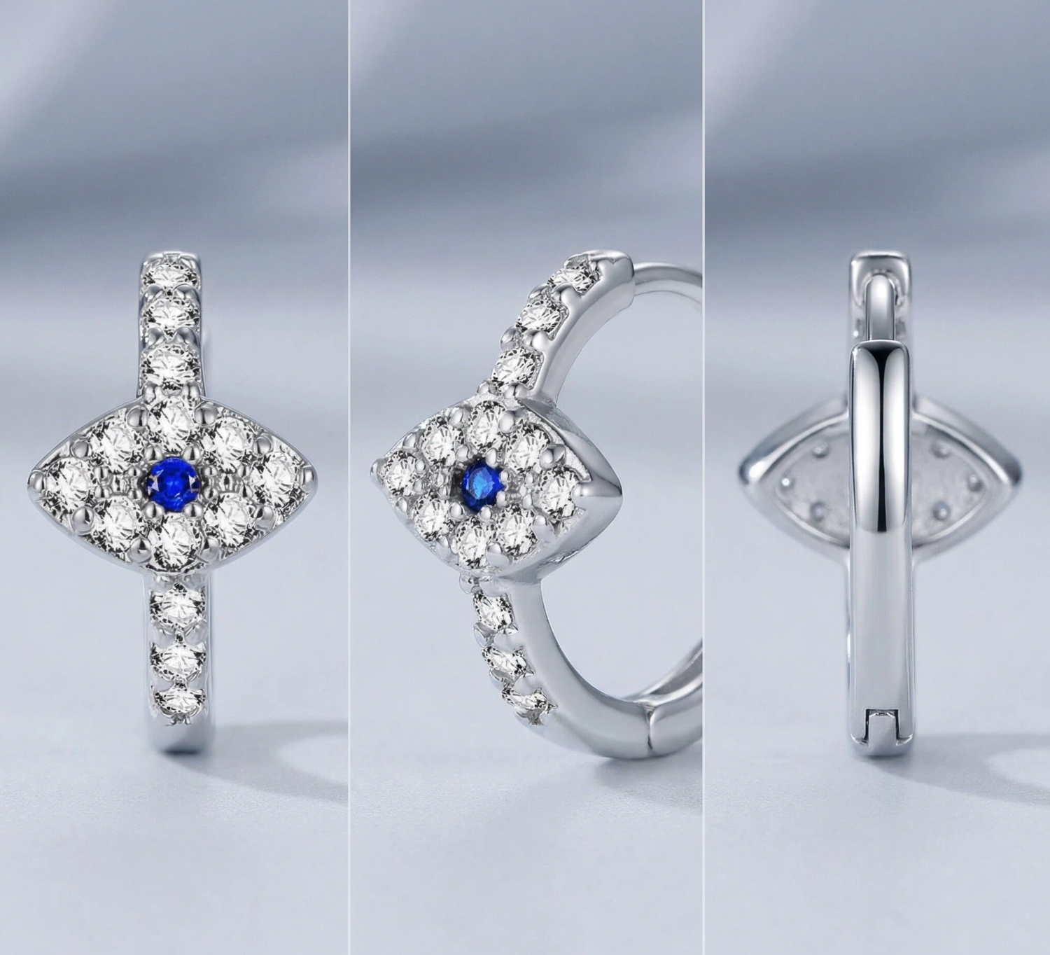 Set of silver earrings with blue gemstones on a light gray background