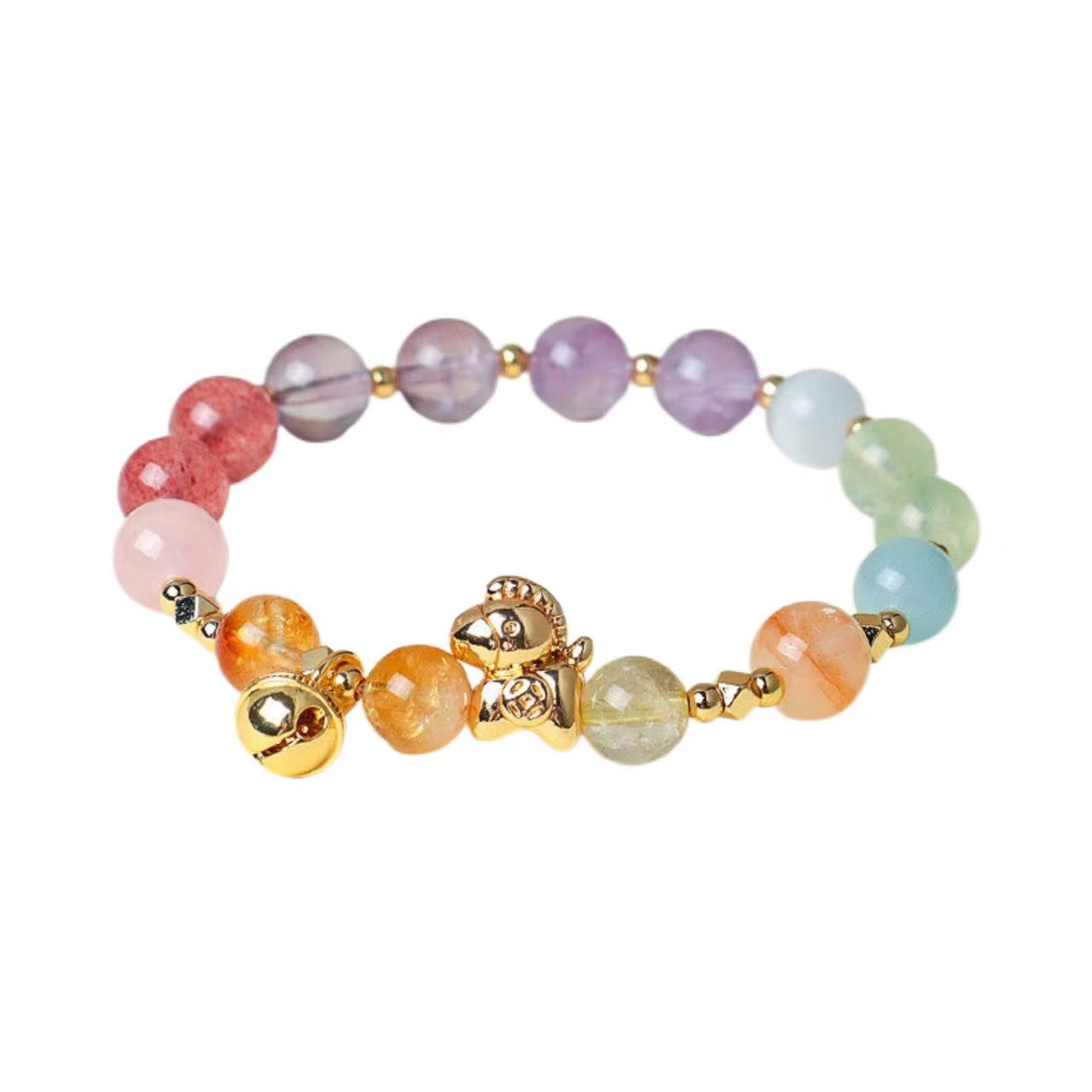 Multicolored beaded bracelet with gold accents on a white background