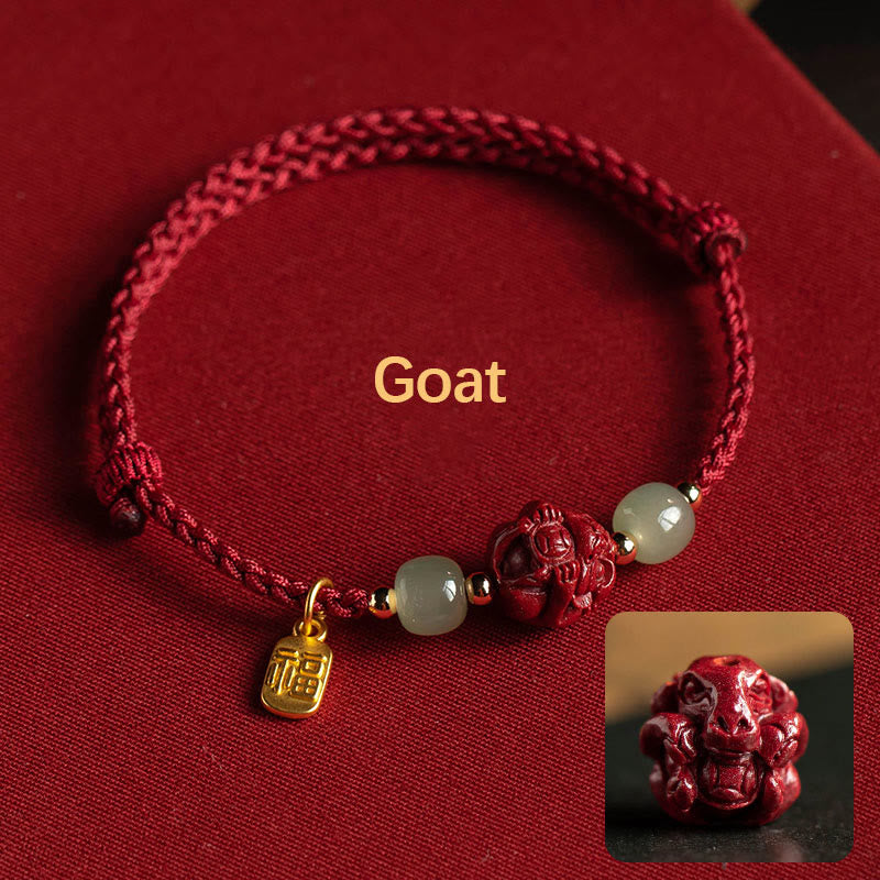 Bracelet with goat charm on a red background