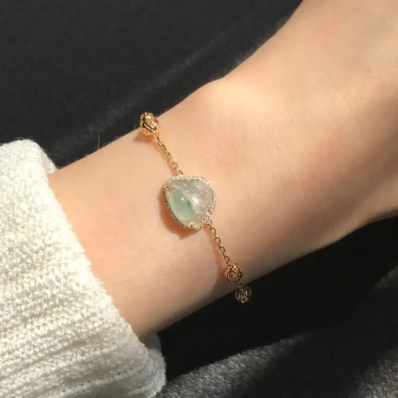 18K gold chain featuring a natural jadeite Buddha pendant, encircled by sparkling diamonds. The Buddha symbolizes peace and joy, paired with exquisite lucky beads. This design blends classic elegance with modern luxury, guarding the wearer's well-being.