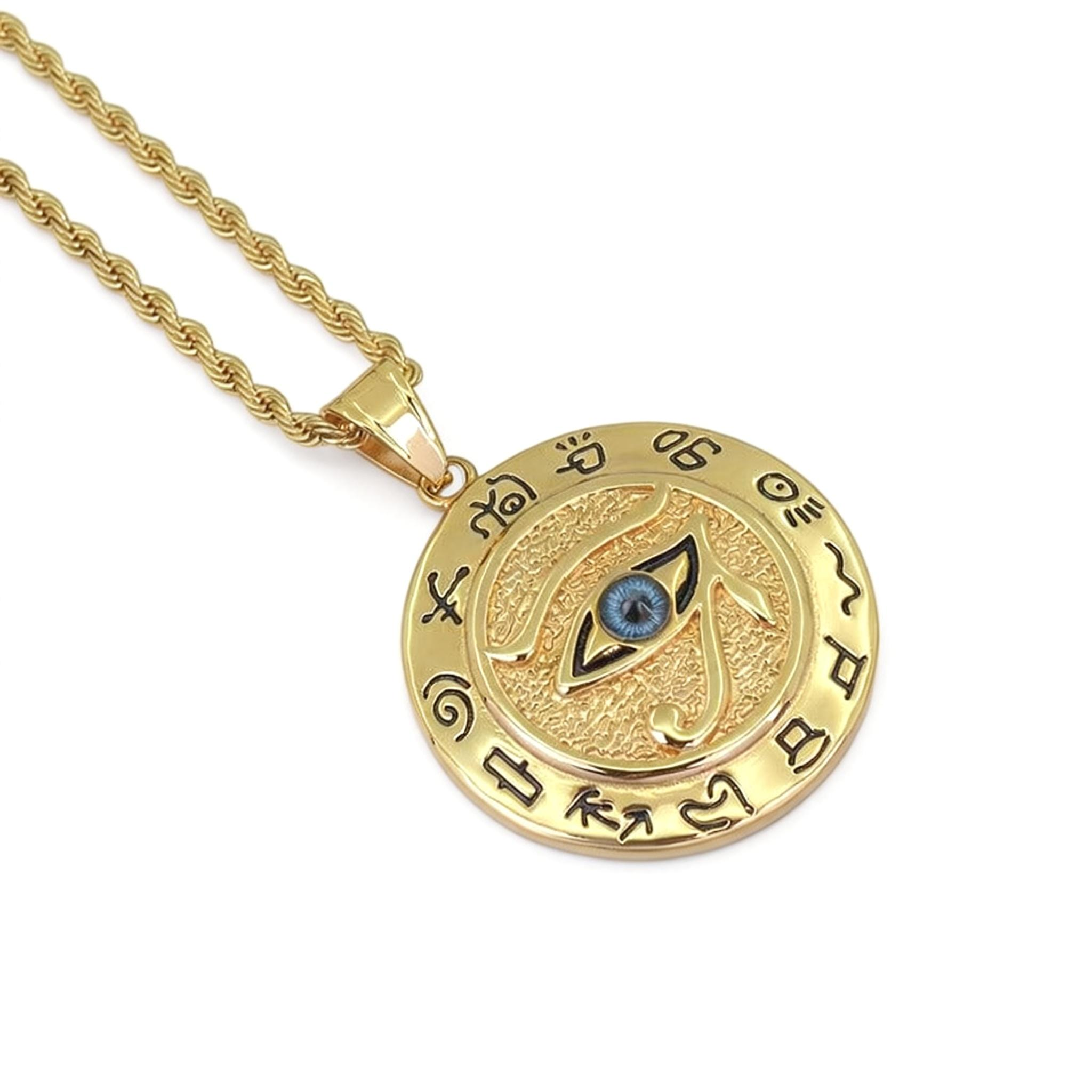 Gold necklace with an eye design pendant on a white background