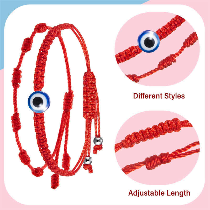 Red bracelet with blue eye charm and adjustable length feature on a pink background