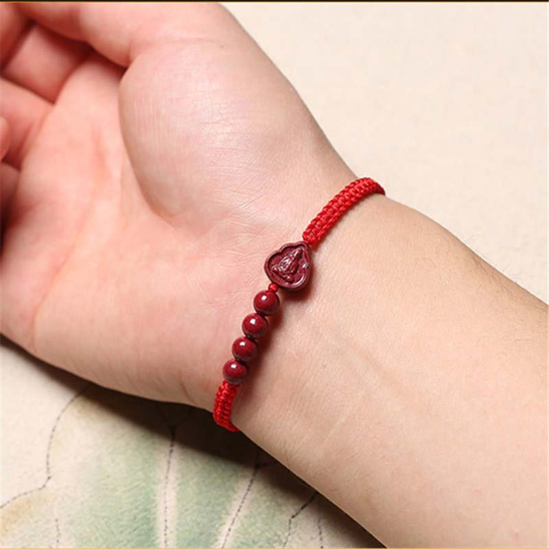 Crafted with traditional red cord and natural cinnabar Maitreya pendant with beads, this bracelet symbolizes joy, prosperity, and peace. As a symbol of auspicious tolerance, Maitreya is a lucky guardian for zodiac years or daily wear, adding warmth and blessings to life.