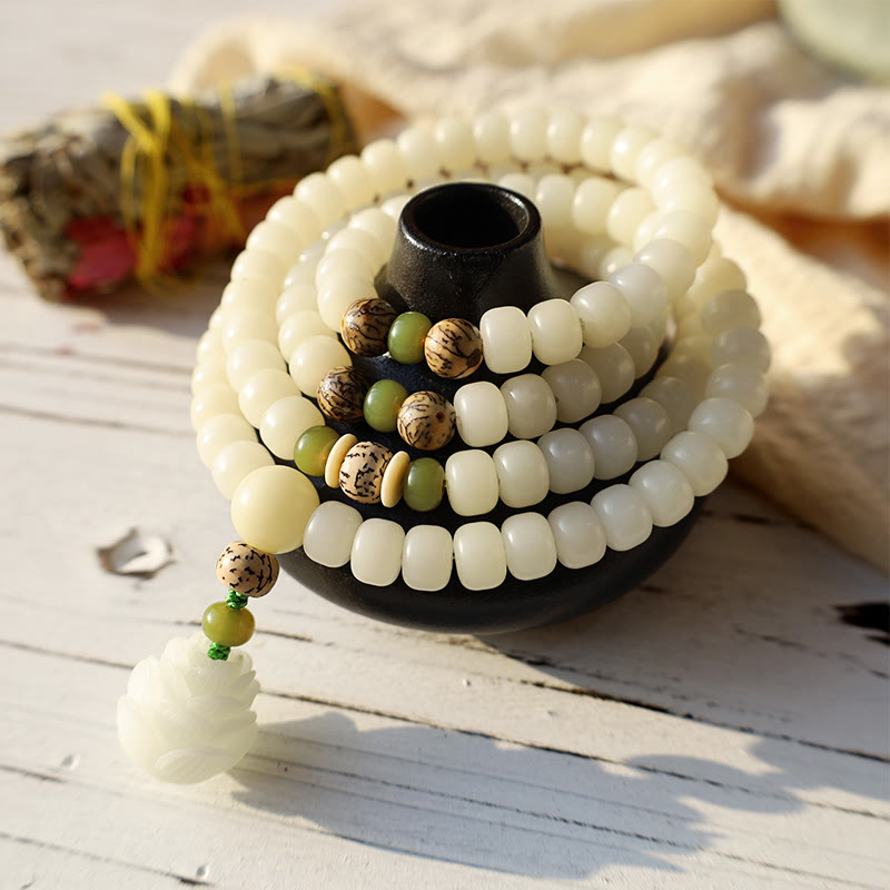 Close-up of white jade and bodhi seed mala beads
