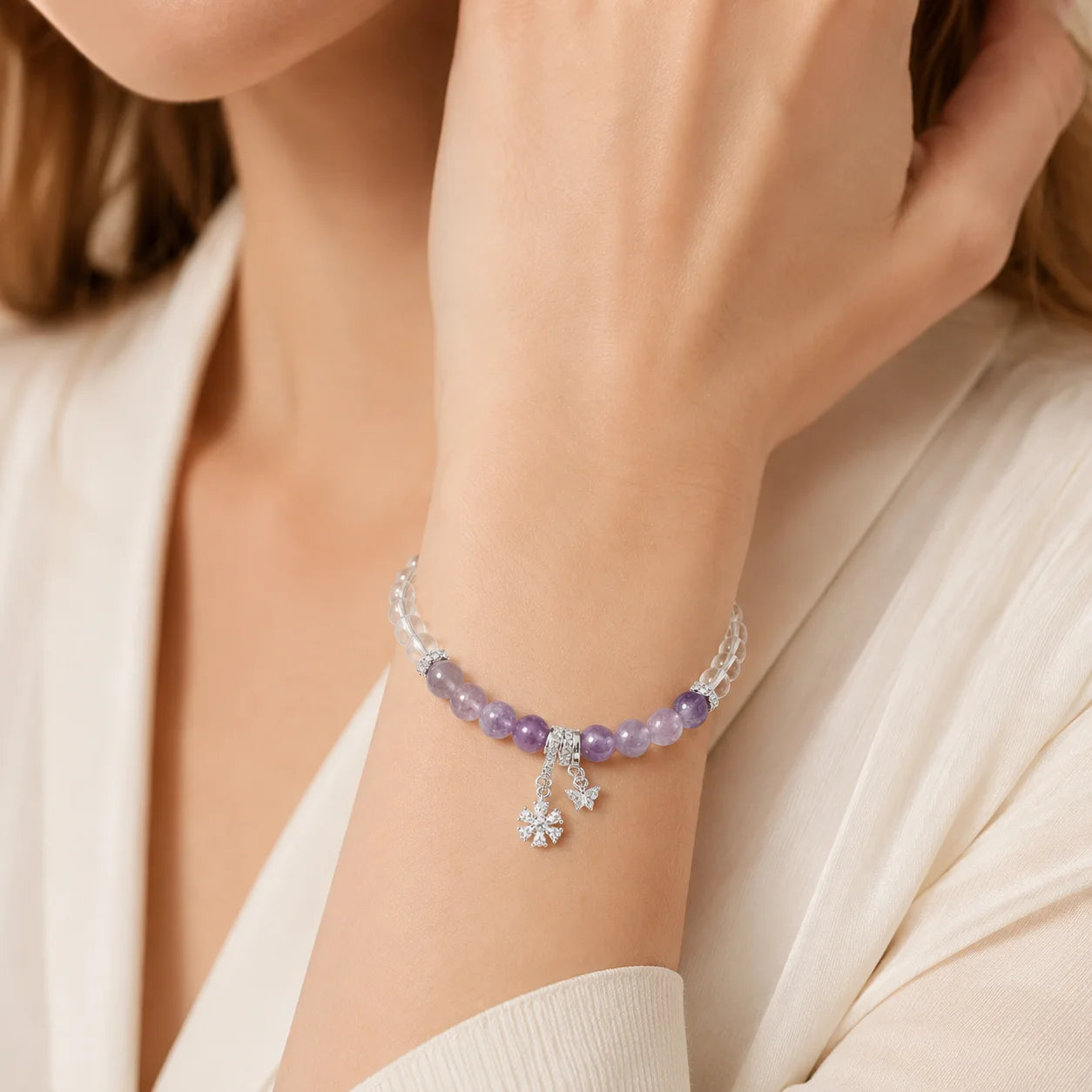 Amethyst Zircon Beaded Bracelet worn on wrist with silver charms