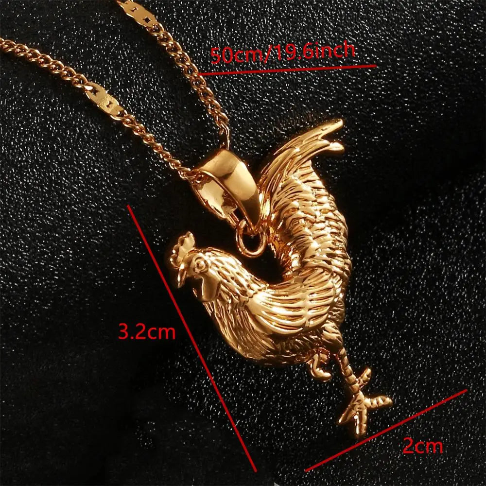 Gold rooster pendant necklace with measurements on a black background