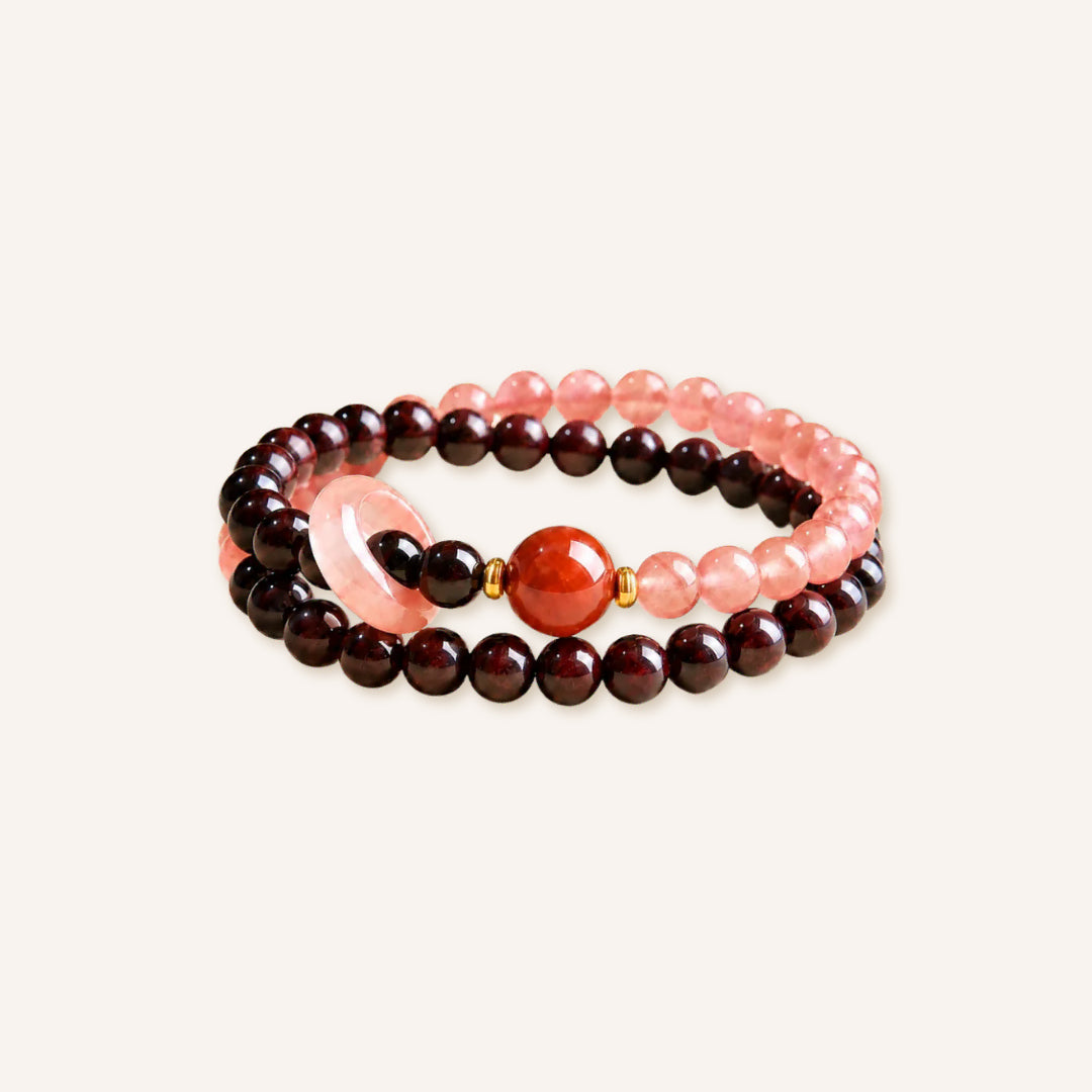Joyful Fortune Sandalwood Agate Bracelet featuring deep sandalwood beads, pink agate beads, a red agate centerpiece, and gold-tone spacer accents in a clean product image.