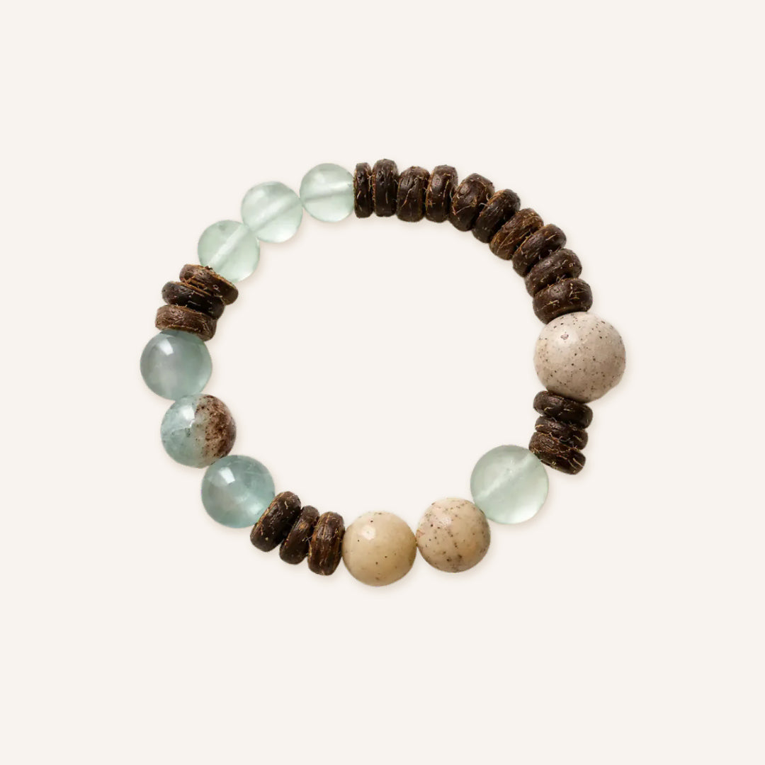 Coconut shell chalcedony bracelet by TheFuMaster