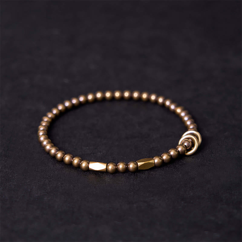 Copper and brass energy bead bracelet close-up for balance and grounding – TheFuMaster