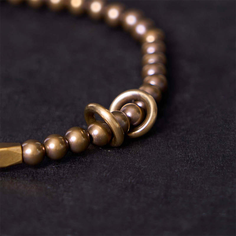 Detail of balance energy copper brass bracelet symbolizing prosperity and strength – TheFuMaster
