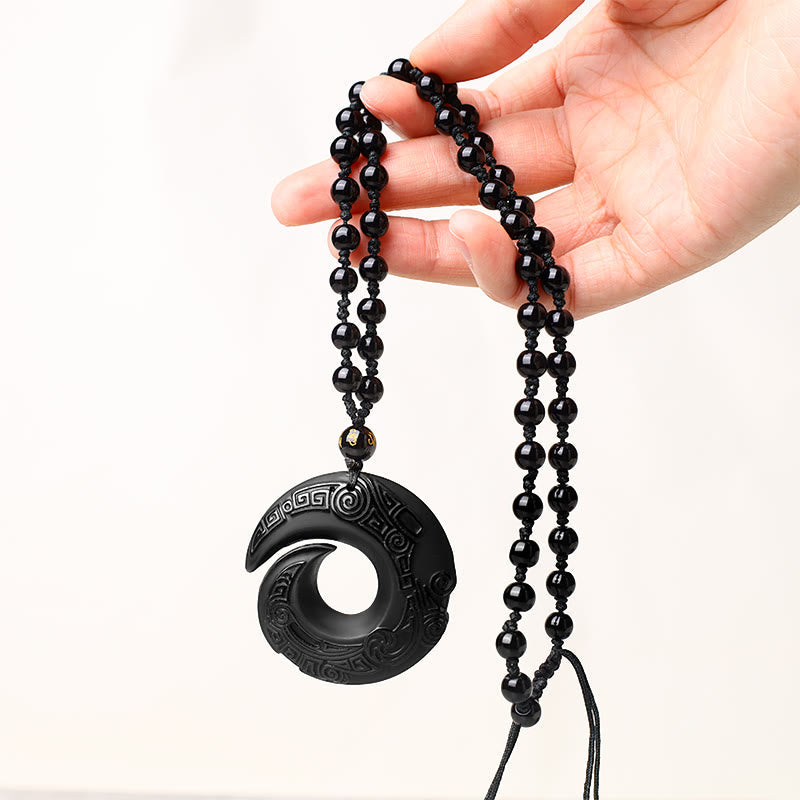 Full necklace display of Dark Circle Black Obsidian Spiral Pendant Necklace