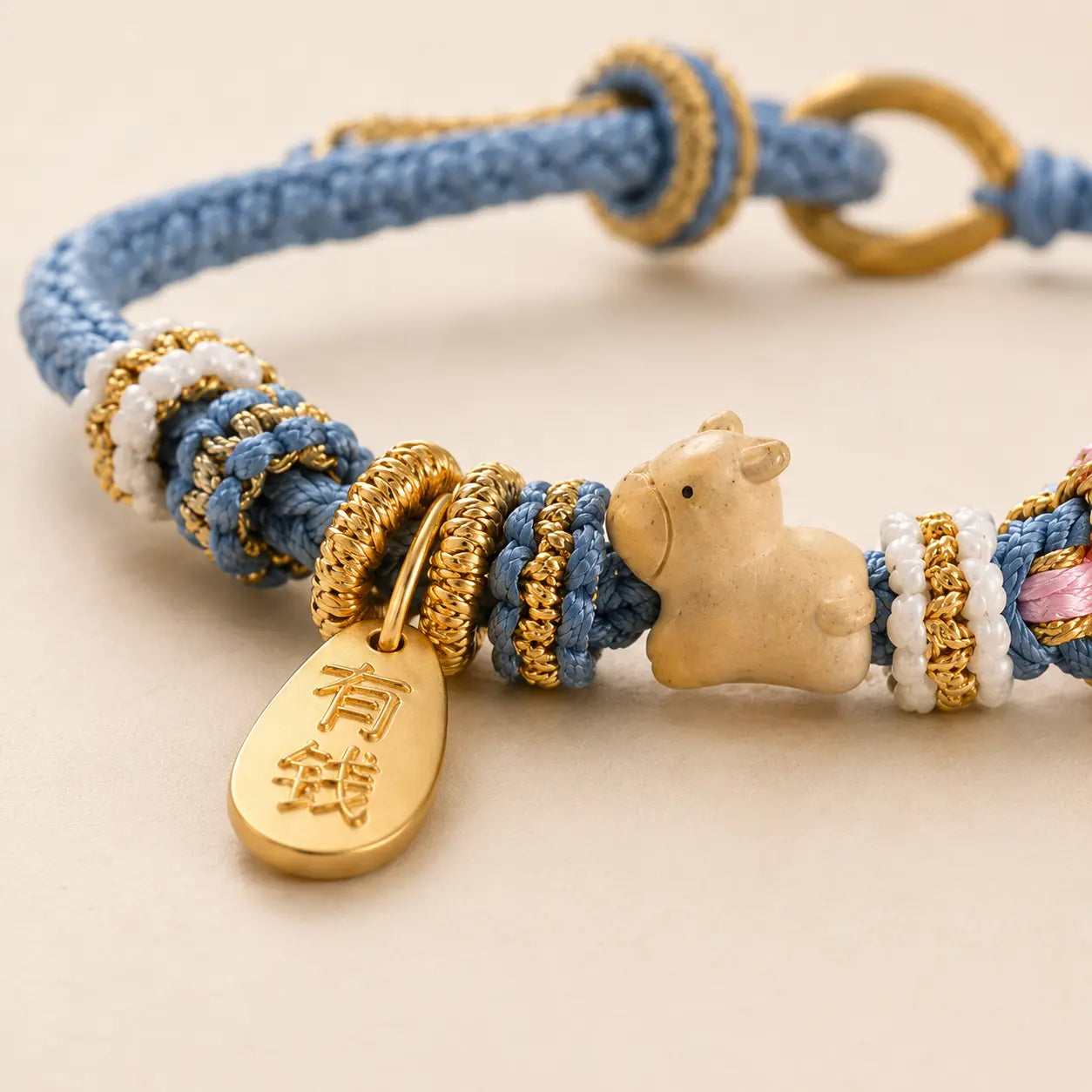 Blue Cord Ox Pendant Bracelet shown from another angle