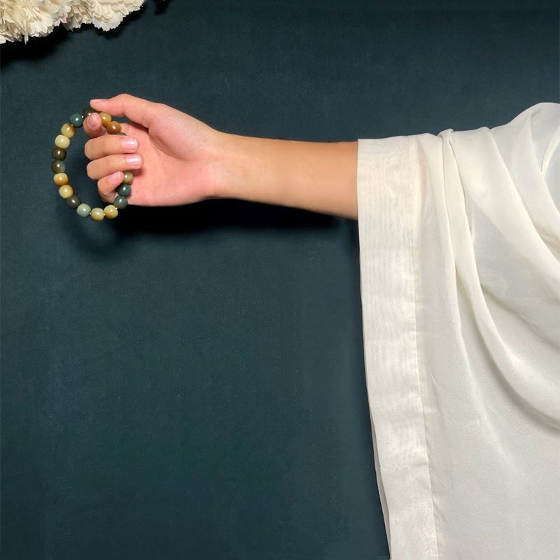 Close-up of Bodhi Seed Wrist Mala with Natural Wood Texture – TheFuMaster