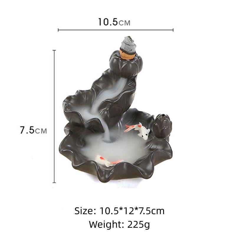 Ceramic incense burner with fish design and dimensions on a white background
