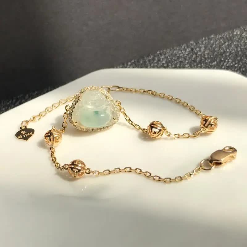 18K gold chain featuring a natural jadeite Buddha pendant, encircled by sparkling diamonds. The Buddha symbolizes peace and joy, paired with exquisite lucky beads. This design blends classic elegance with modern luxury, guarding the wearer's well-being.