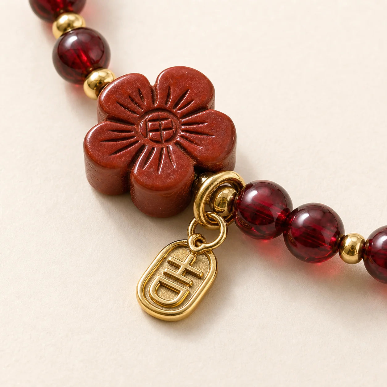 Garnet Cinnabar Flower Bracelet shown from another angle with garnet and cinnabar