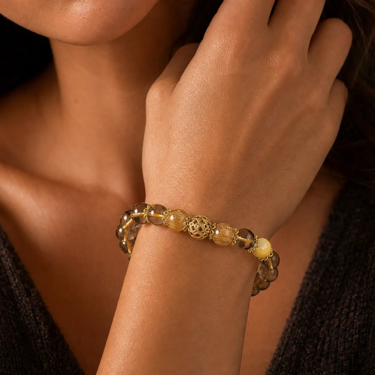 Natural Citrine Prosperity and Protection Bracelet worn on wrist with gold accents