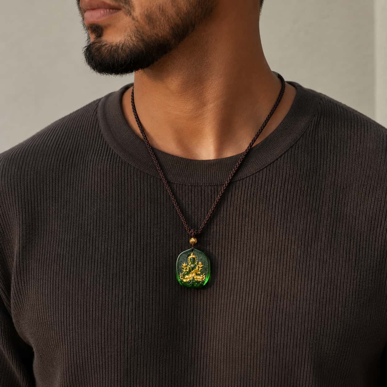 Close-up of Green Glaze Compassion Symbol Pendant Necklace