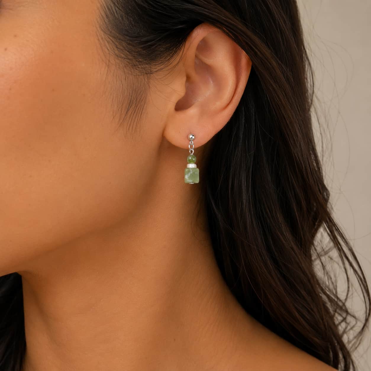 Close-up of Green Xiuyan Jade Shell Stud Earrings with green jade