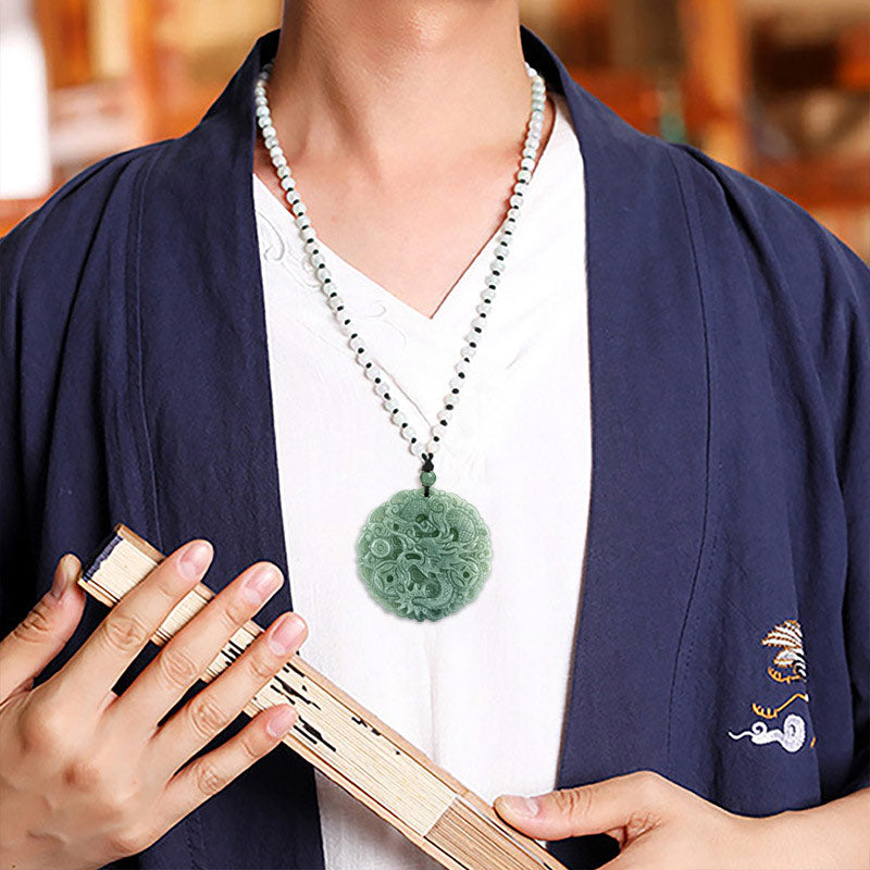 Imperial Pulse Jade Dragon Pendant worn with traditional styling
