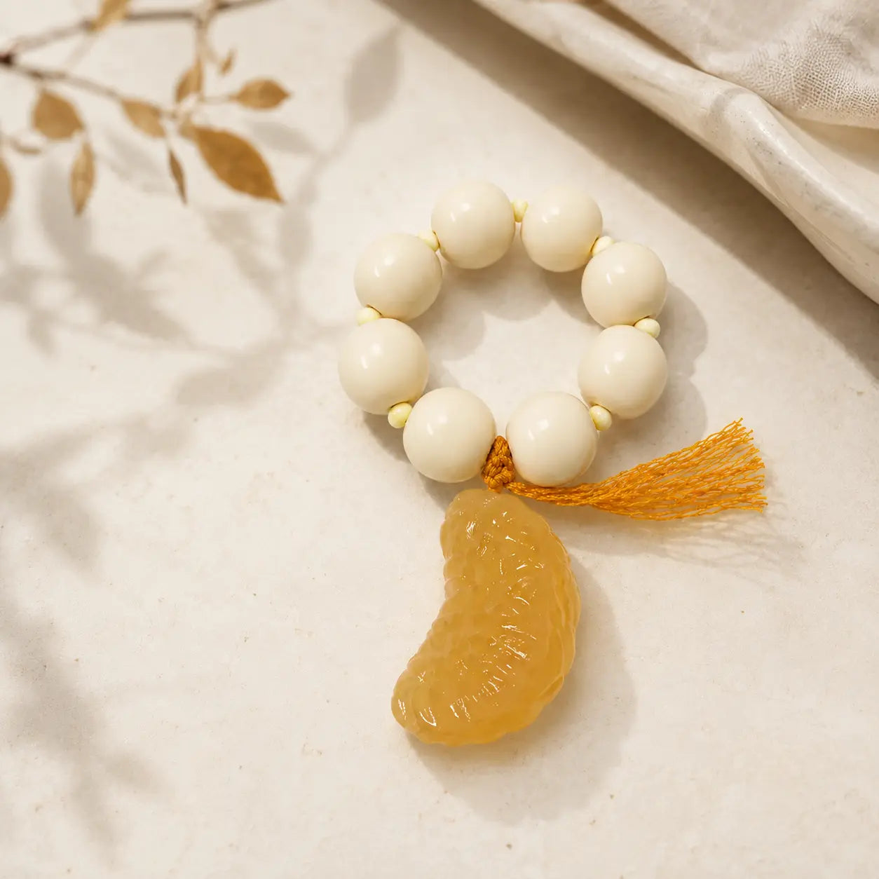 Ivory Nut Orange Slice Handheld Beads shown from another angle