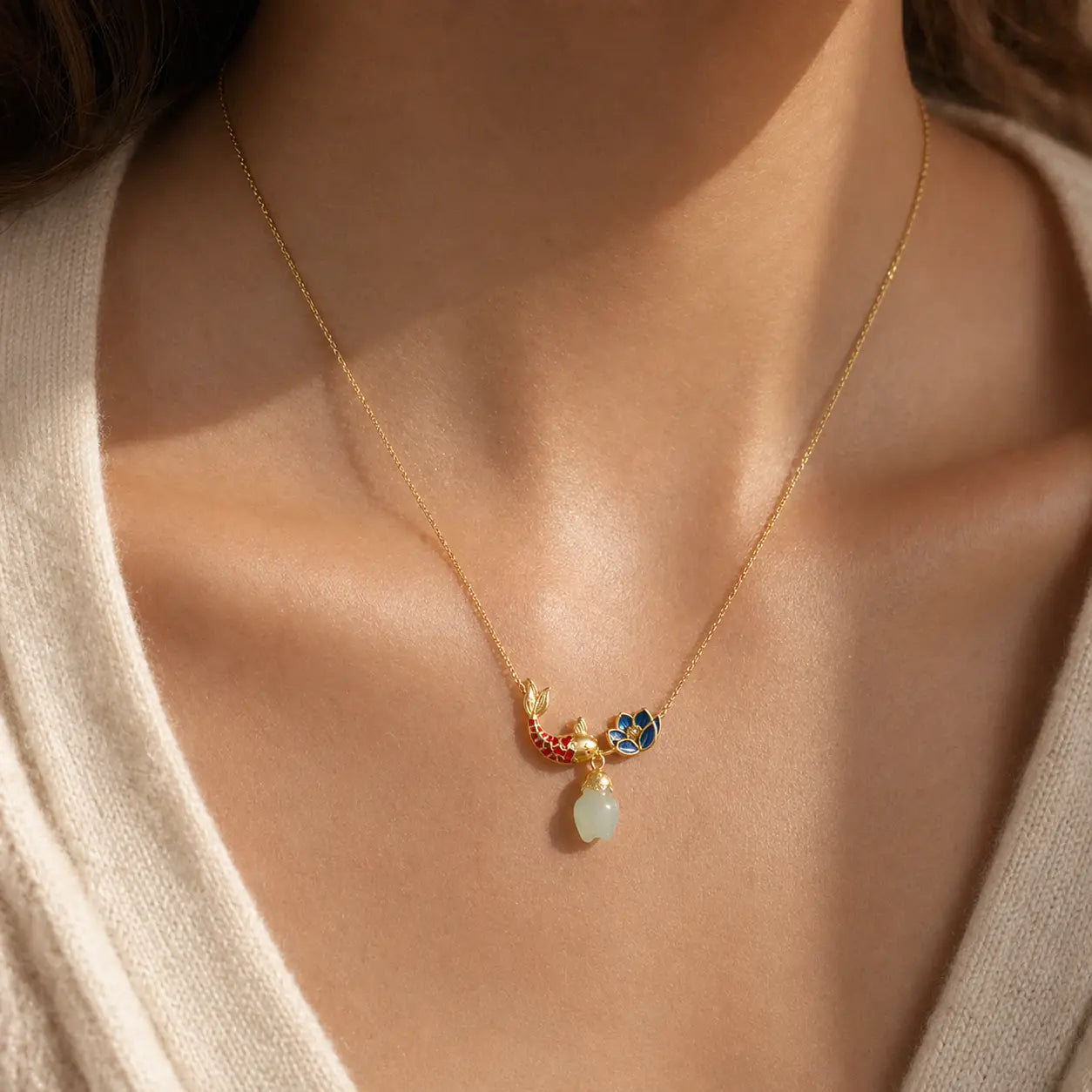 Fortune Koi Enamel Lotus Pendant Necklace worn with a beige top