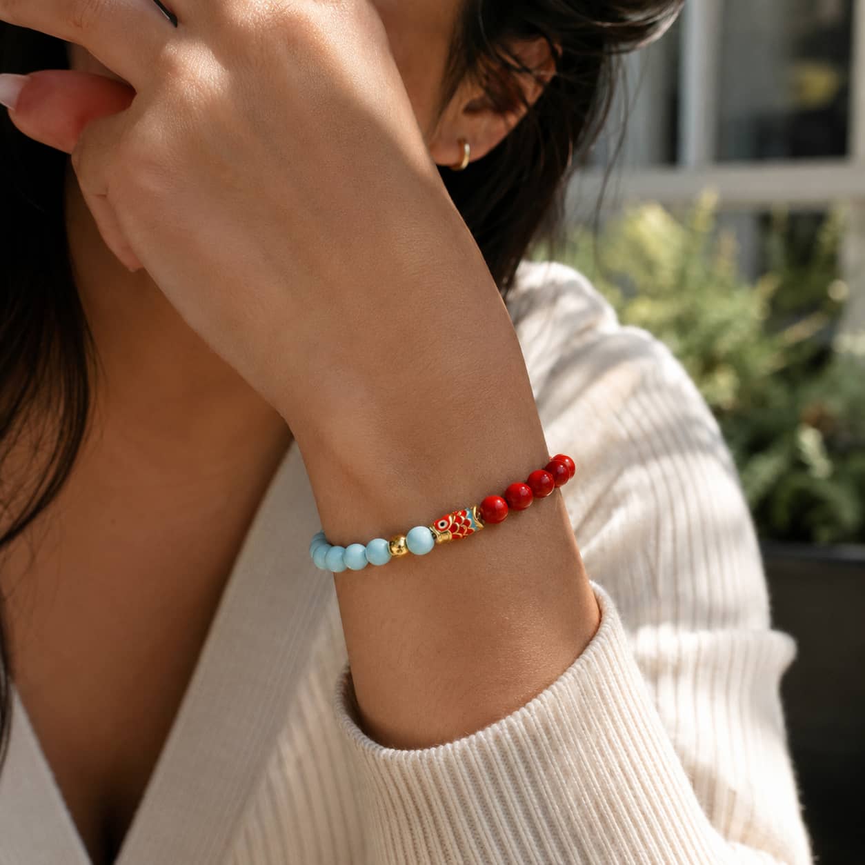 Close-up of Koi Luck Turquoise & Cinnabar Bracelet with cinnabar and turquoise