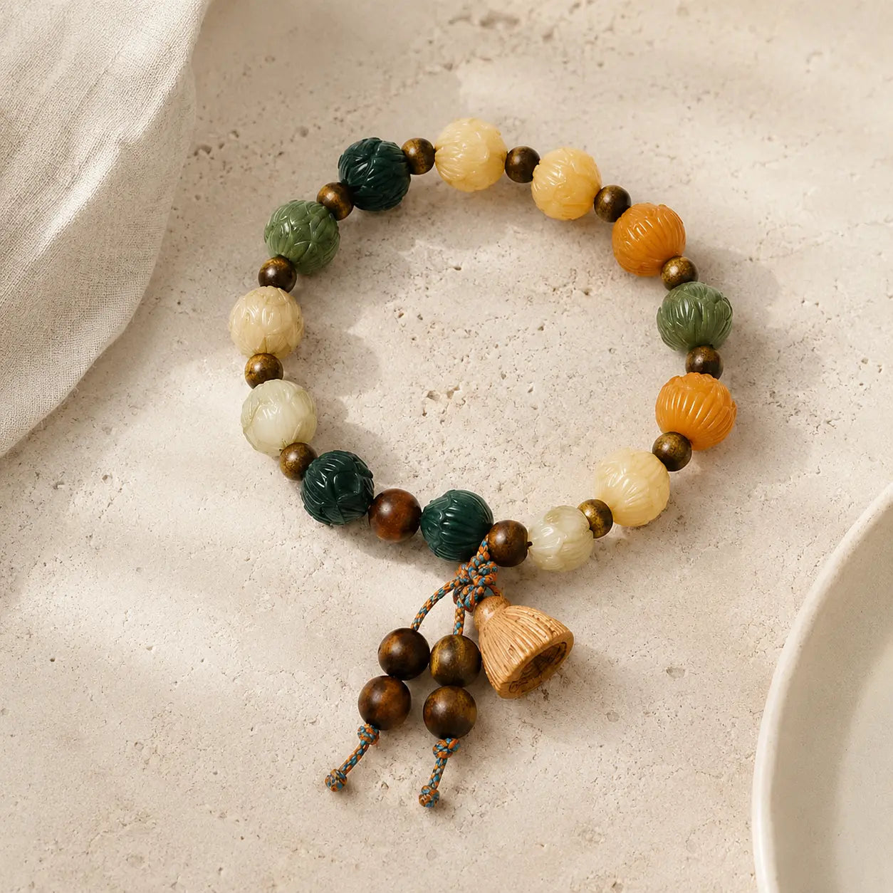Lotus Bodhi Bracelet detail view with bodhi and sandalwood