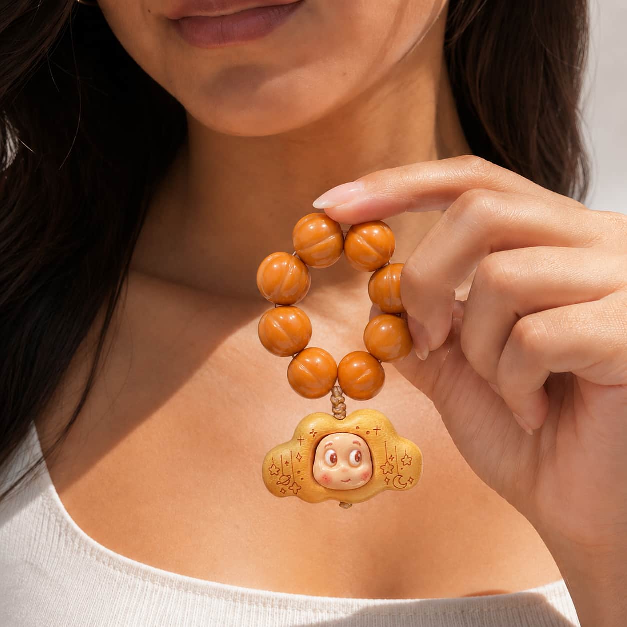 Close-up of Peach Pit Handheld Beads