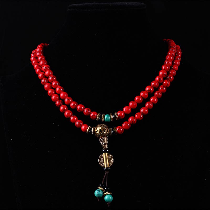 Red turquoise mala necklace displayed on bust stand – TheFuMaster