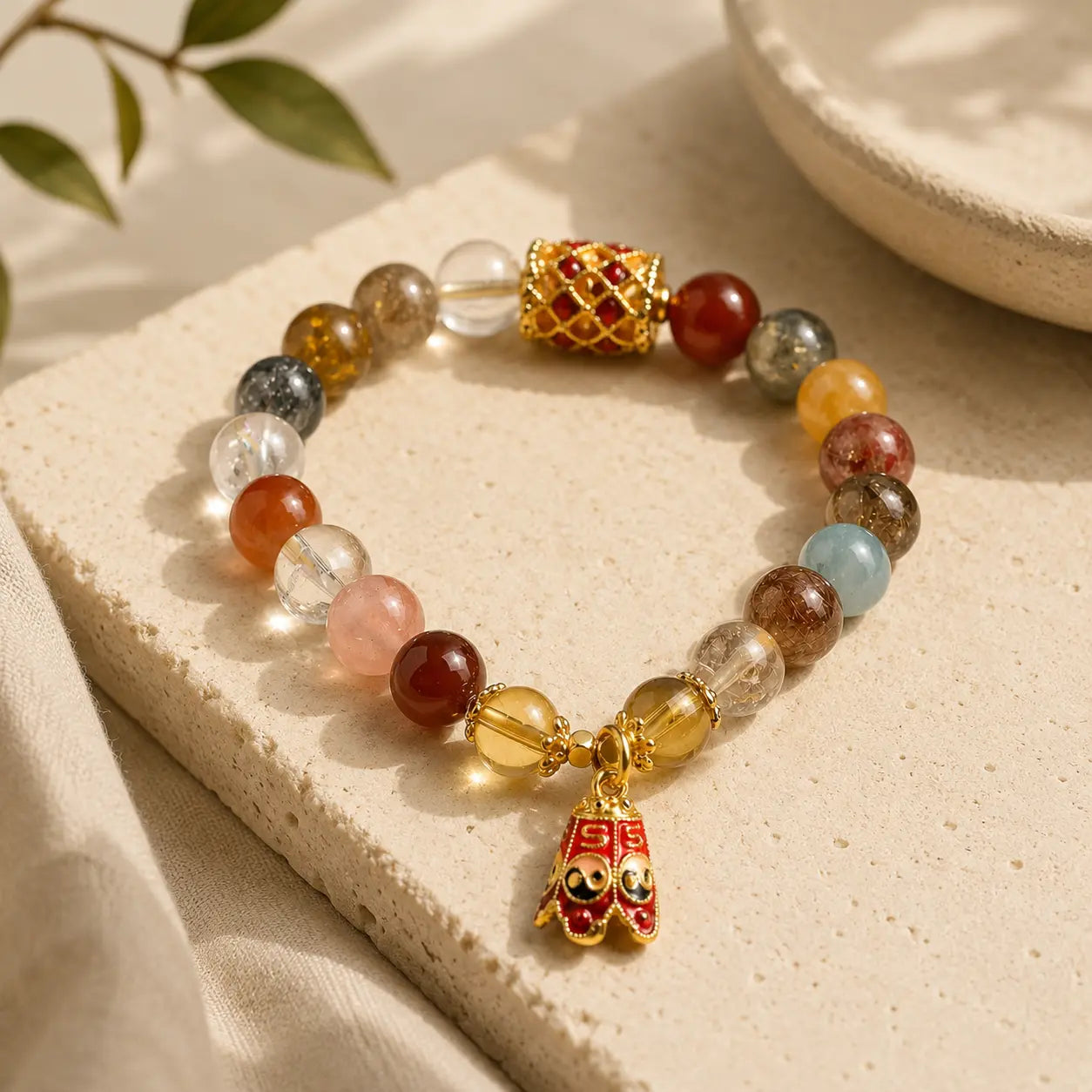 Rutilated Quartz Yin Yang Bracelet detail view with rutilated quartz