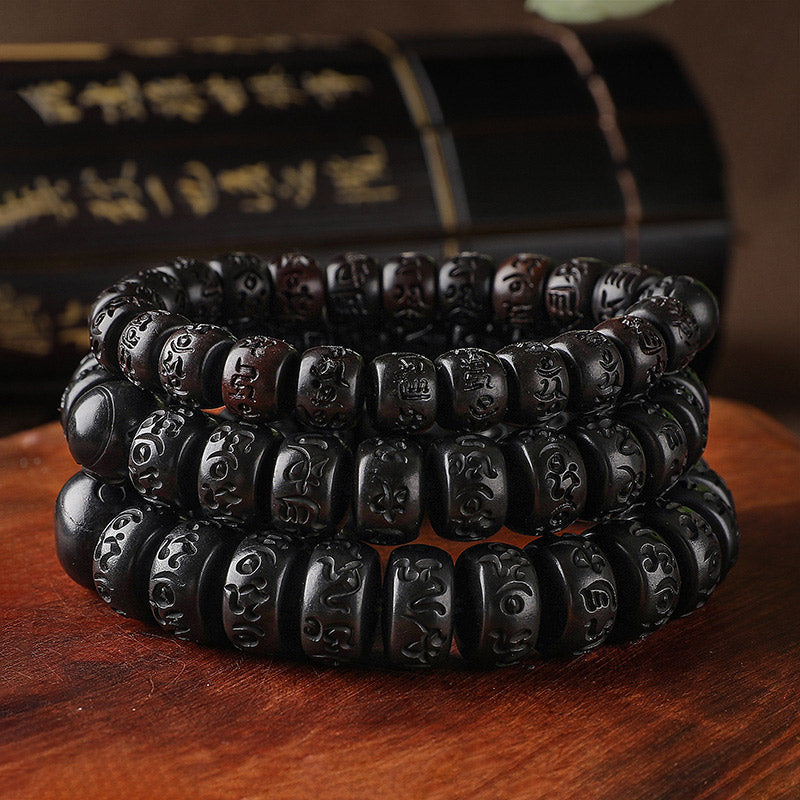Close-up of TheFuMaster lightning-strike wood beads highlighting natural patterns and thunder marks.