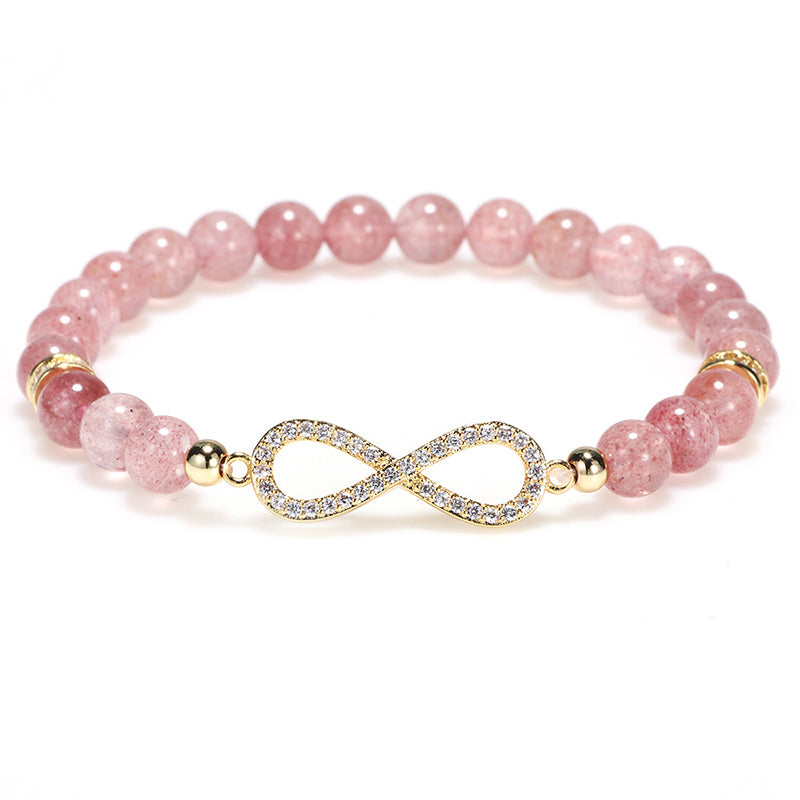 Side view of TheFuMaster Strawberry Quartz Infinity Bracelet showing crystal details and gold accents