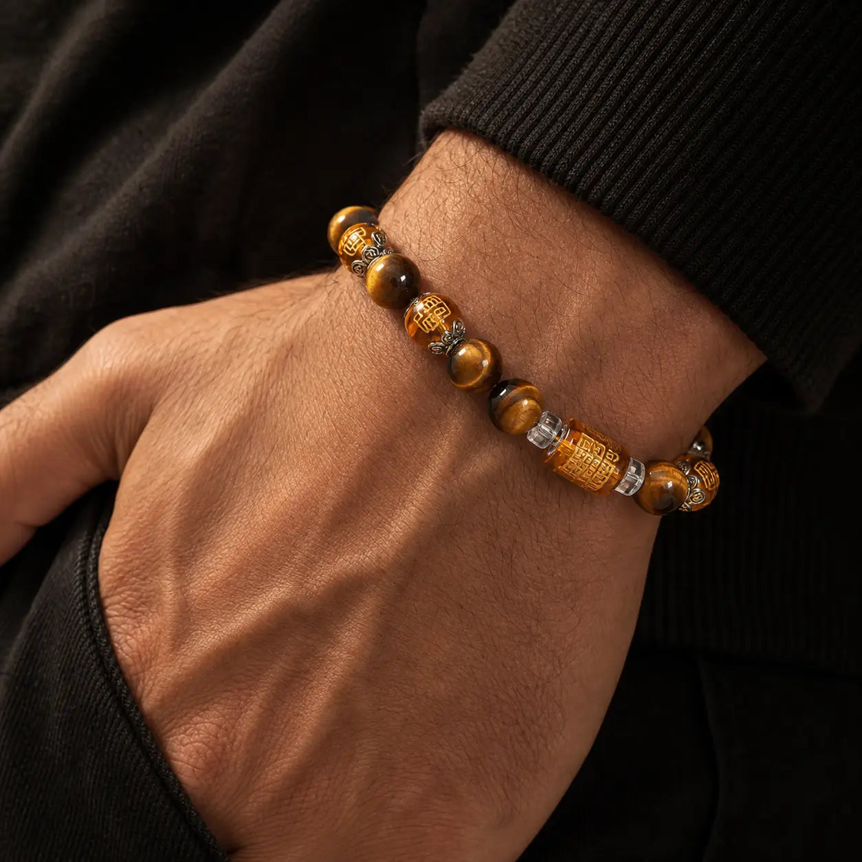 Natural Tiger Eye Fortune and Prosperity Bracelet worn on wrist with golden brown beads