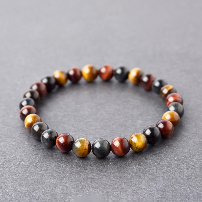 Close-up of Tiger’s Eye gemstone texture showing natural reflections and grounding hues