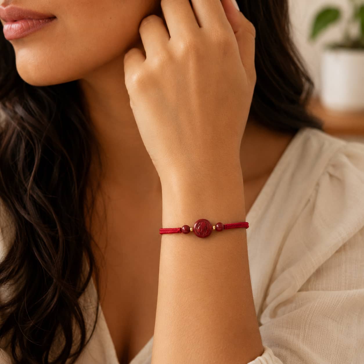 Vermilion Ox Red String Bracelet detail showing red woven cord and ox pendant