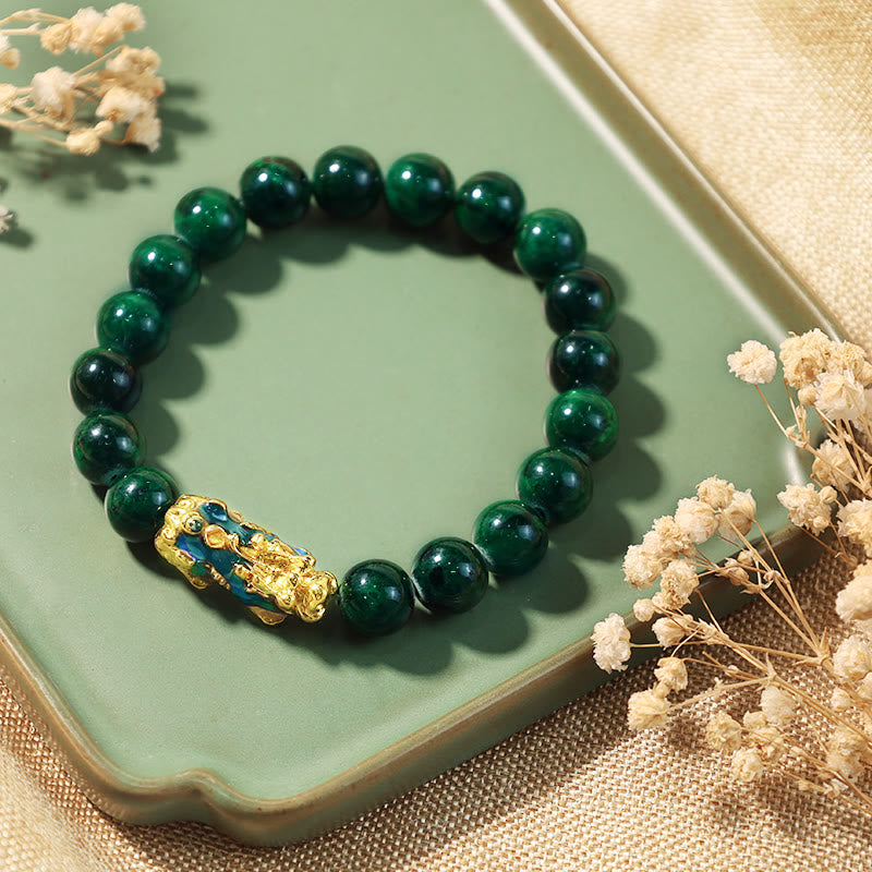 Jade PiXiu bracelet on natural background, symbol of wealth & protection – TheFuMaster