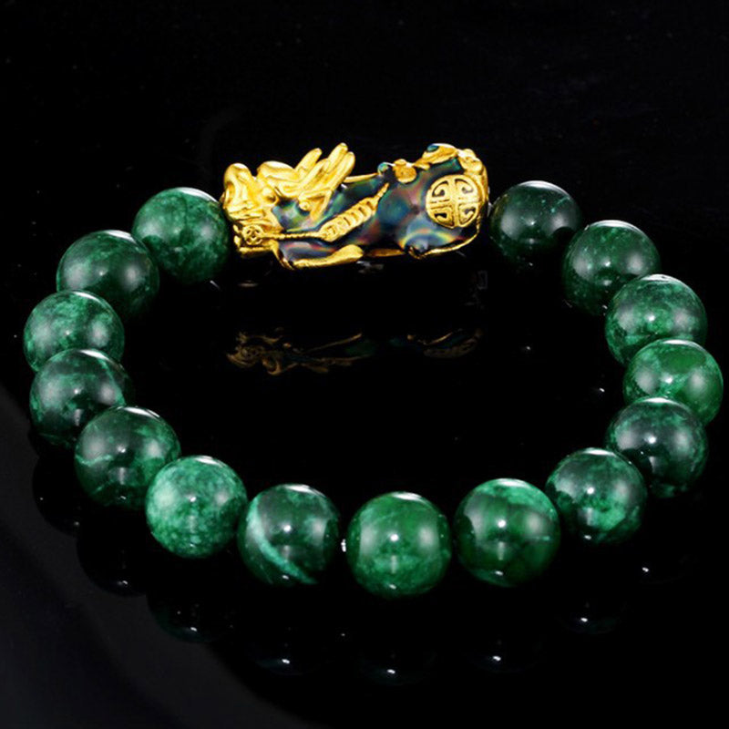 Side view of green jade PiXiu bracelet showing detailed gold charm – TheFuMaster Energy Jewelry