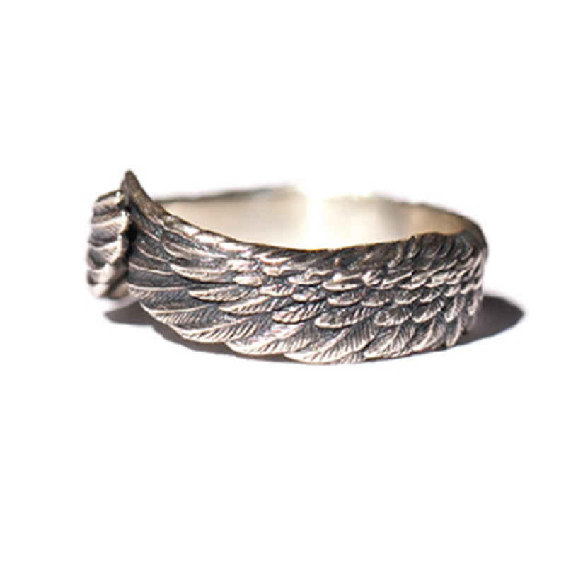 Angled close-up of Wing Luck Lucky Ring with open adjustable band – TheFuMaster Energy Jewelry