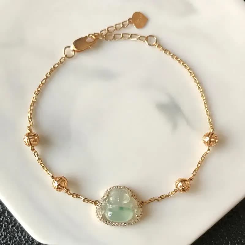18K gold chain featuring a natural jadeite Buddha pendant, encircled by sparkling diamonds. The Buddha symbolizes peace and joy, paired with exquisite lucky beads. This design blends classic elegance with modern luxury, guarding the wearer's well-being.
