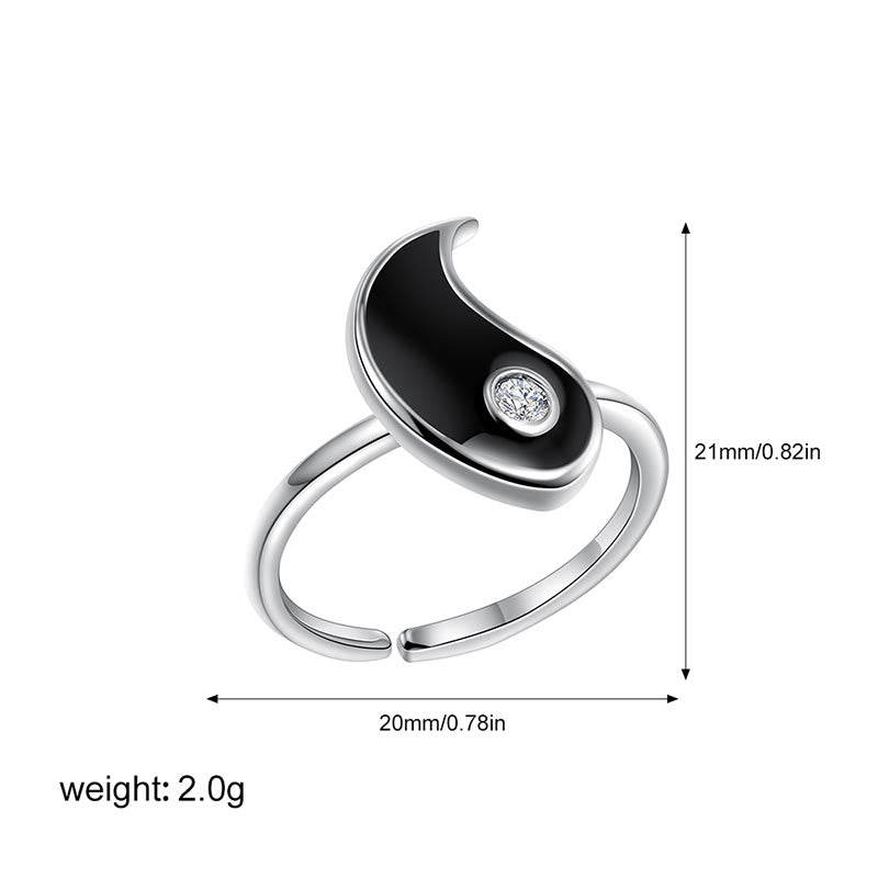 Silver ring with black half-moon design and diamond, shown with measurements and weight on a white background.