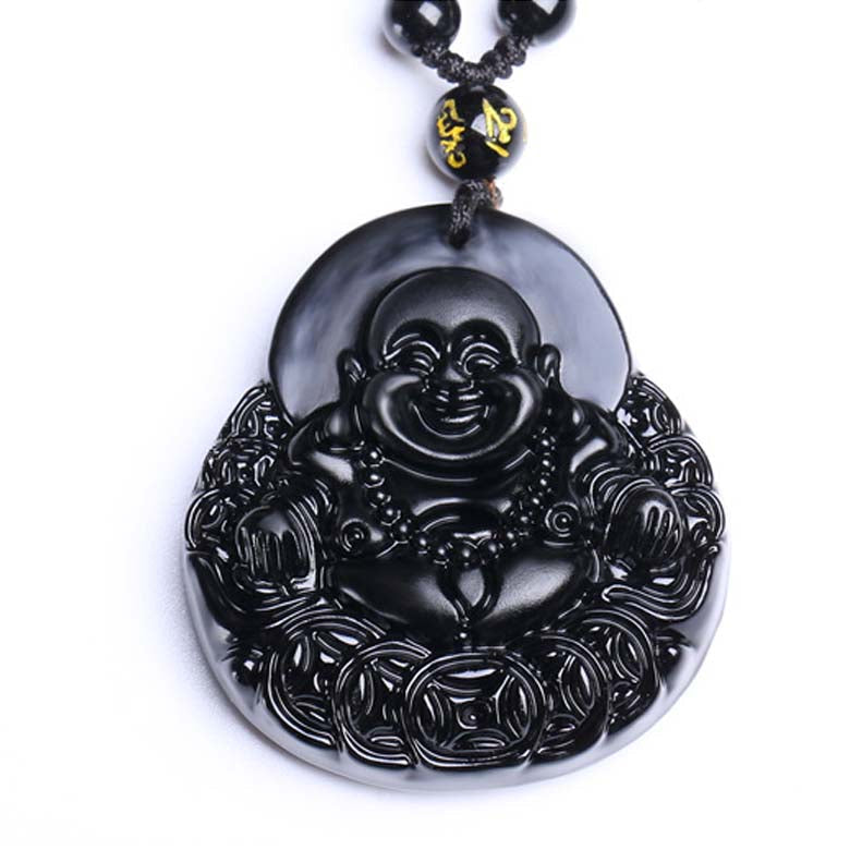 Black Buddha pendant on a white background