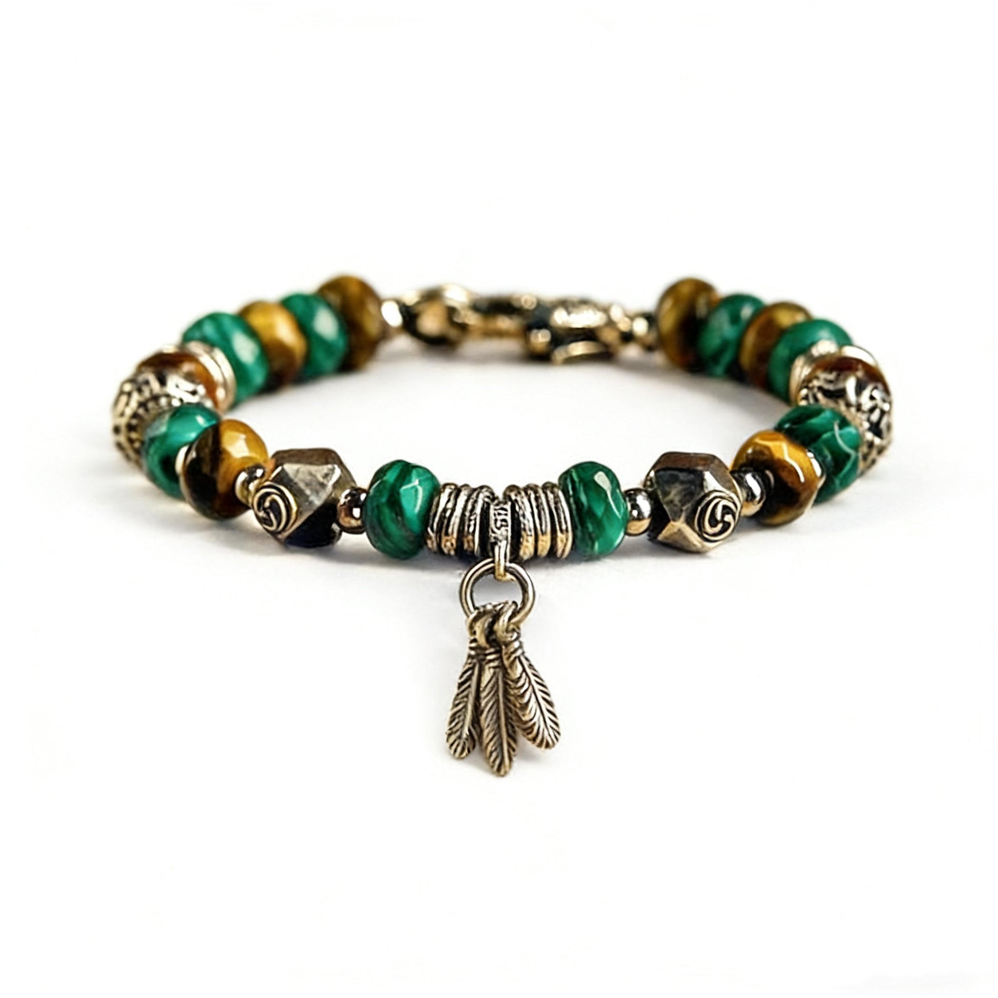 Bracelet with green and gold beads on a white background