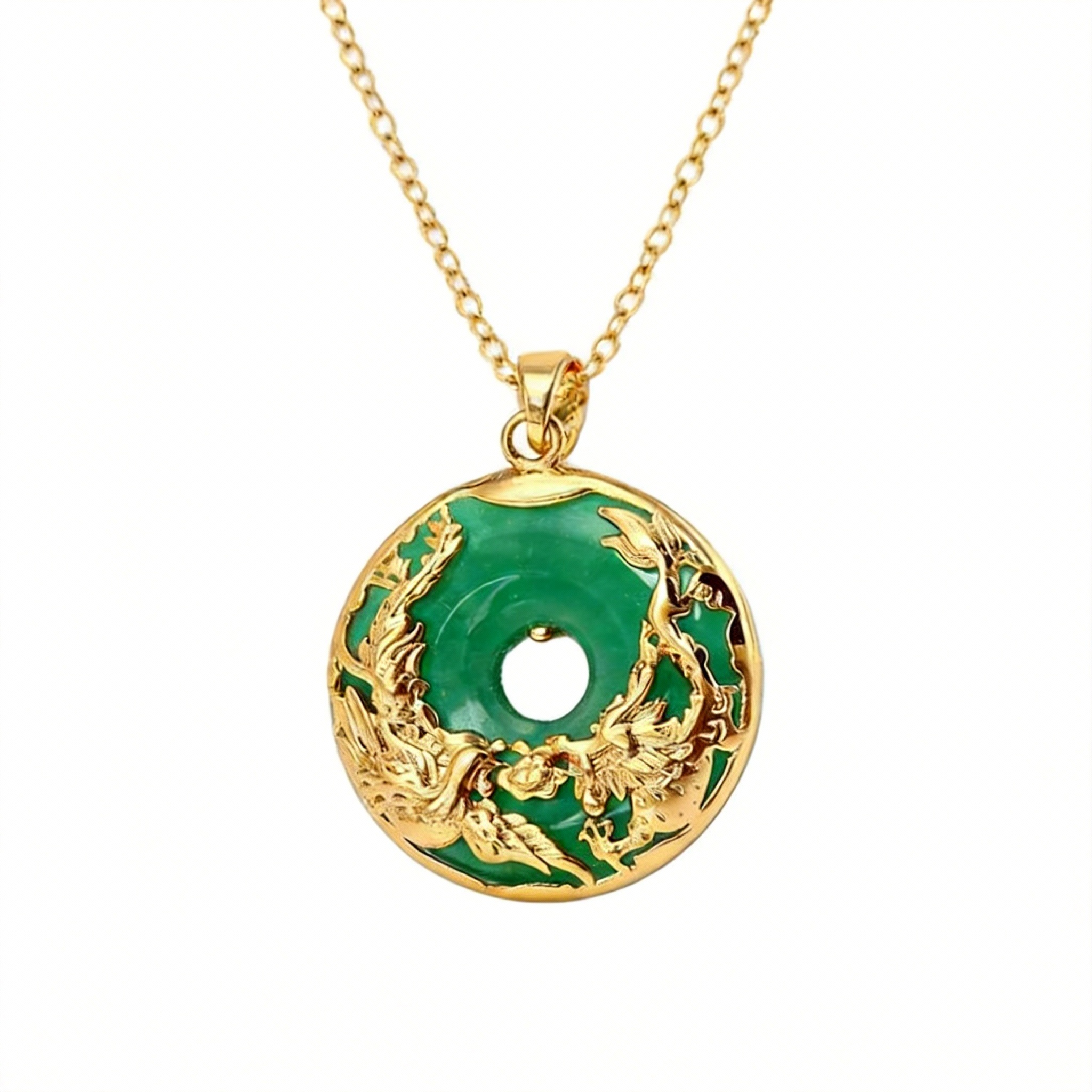 Gold and green pendant necklace on a white background